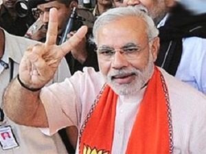 Narendra Modi flashes the victory sign